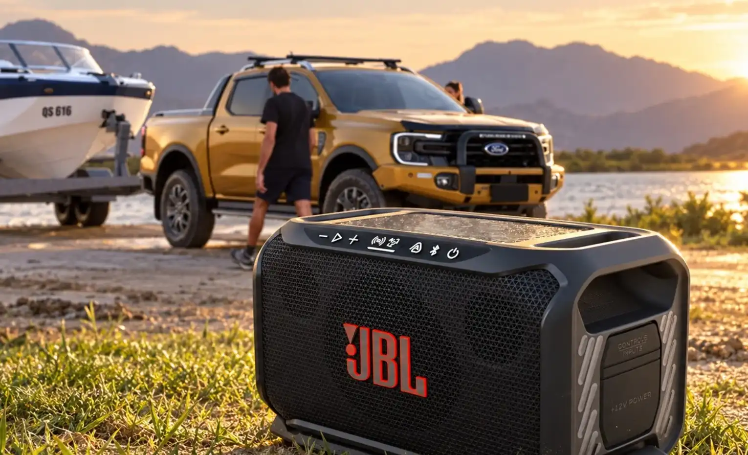 JBL BassPro Go2 با سابووفر بیسیم Auracast معرفی شد اسپیکر JBL در فضای باز کنار وانت و قایق هنگام غروب